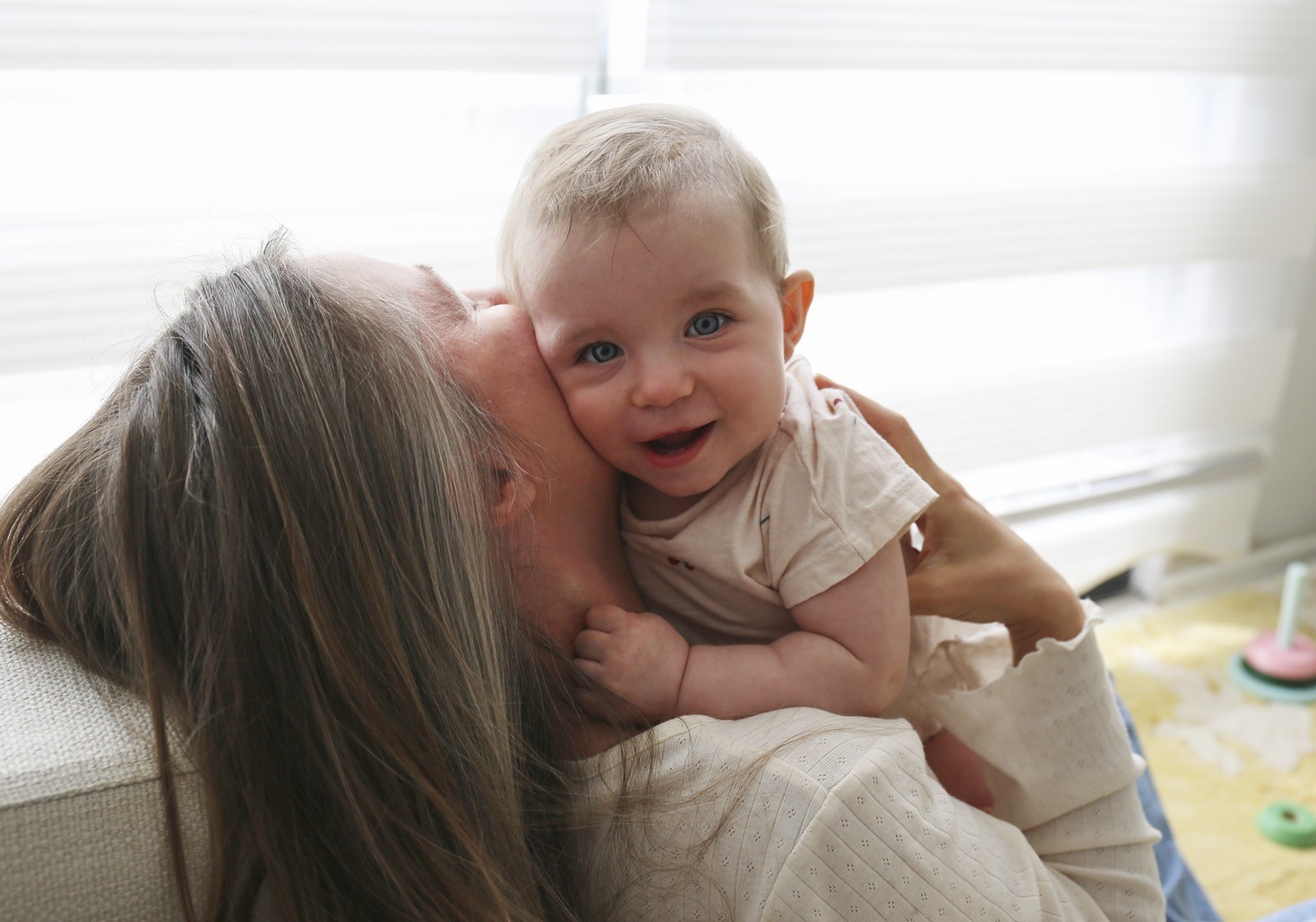 happy baby with mom.jpg